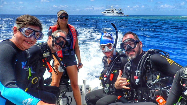 Divers preparing to tender drop